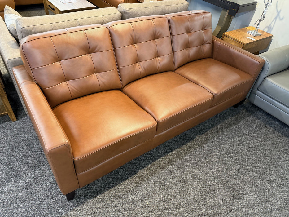 Canadian-made leather Aiden Sofa with biscuit tufted back cushions, shown in Nutmeg colour