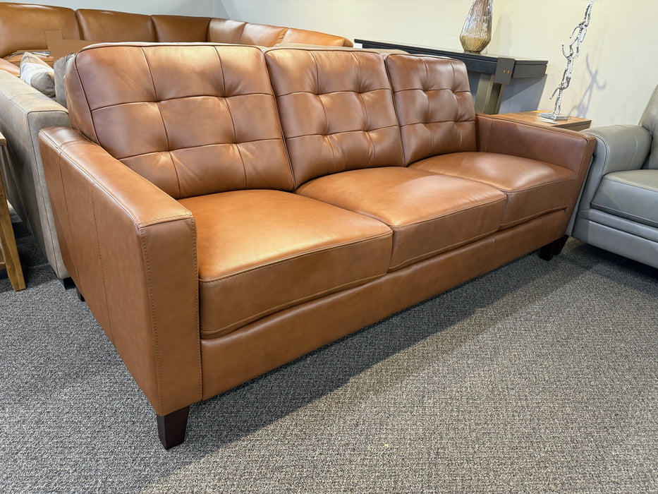 Canadian-made leather Aiden Sofa with biscuit tufted back cushions, shown in Nutmeg colour