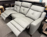 reclined view of genuine top grain leather Canadian-made Chinook power Reclining Sofa shown in Slate colour