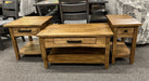 Glengarry occasional tables in solid Wormy Ambrosia Maple with Heritage Barley finish, featuring a coffee table, end table and chairside table, each with a single drawer, lower shelf and black metal hardware.