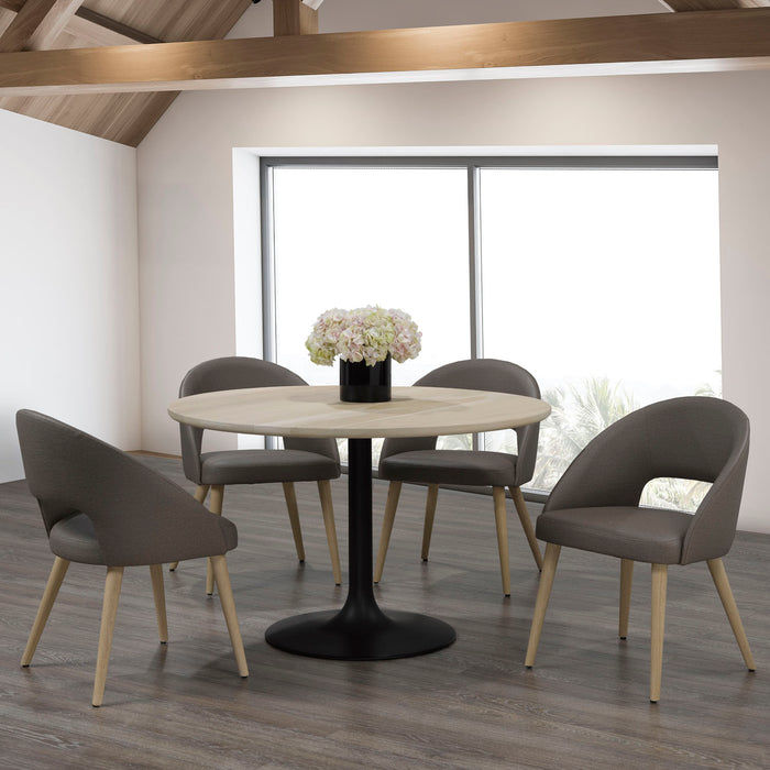 round Tulip-style table with a solid wood top in a natural finish and a sleek black pedestal base, paired with 4 grey fabric upholstered dining chairs with curved backs and tapered wood legs