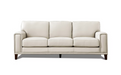 Hayward sofa fully upholstered in a vanilla coloured genuine top grain leather, featuring a clean, low-profile silhouette with three cushioned back and seat sections, broad square arms and tapered dark wood legs.