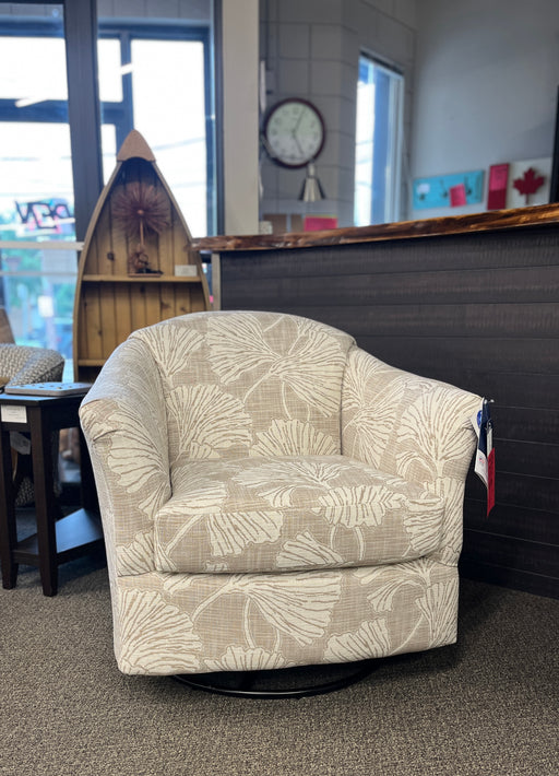 Darby swivel glide barrel chair shown in leafy taupe colored fabric upholstery