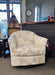 Darby swivel glide barrel chair shown in leafy taupe colored fabric upholstery